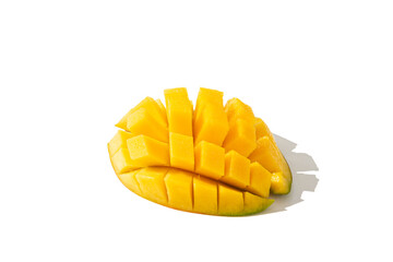 Juicy mango cut in cubes isolated on white background. Side view