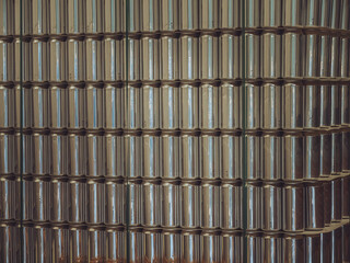 A stack of empty aluminium cans waiting to be filled with fresh beer.