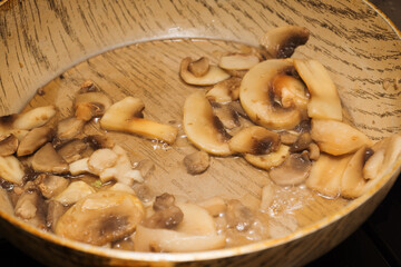 fresh mushroom julienne is cooked
