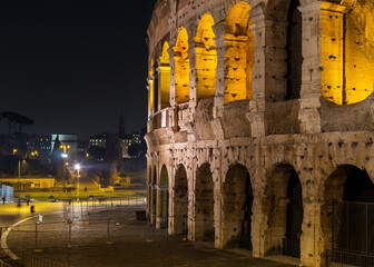 Fototapeta na wymiar A view of Flavian Amphitheatre (Colosseum) at night, Rome, Italy