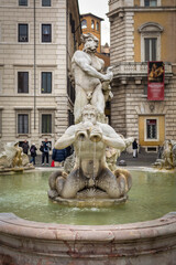 Fototapeta na wymiar Fontana del Moro (Moor Fountain) located at the southern end of the Piazza Navona. Rome, Italy