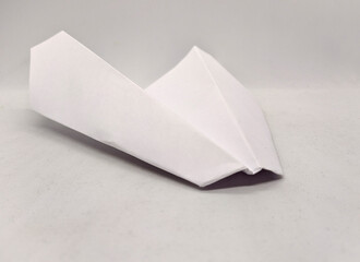 one paper plane on a white background.