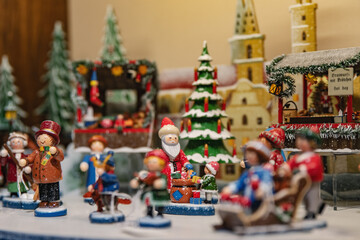 Traditional wooden Christmas toys on the showcase