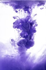 Two drops of color merged under water create colorful organic abstract form and shapes with detailed structures. Blue and magenta ink color swirl.