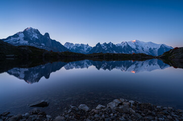Dawn at Lac des Cheserys, with the first sunlight shining on the Mont Blanc.