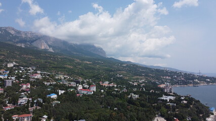 The city of Simeiz on the Black Sea coast in Crimea against the background of mountains
