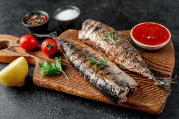 grilled mackerel on stone background 