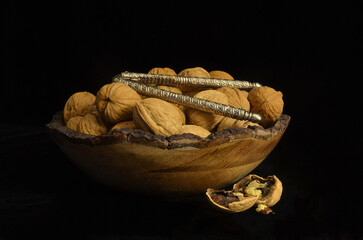 walnuts and nutcracker in a bowl