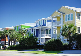 Bright new pastel color houses in Carolina Beach, North Carolina - obrazy, fototapety, plakaty