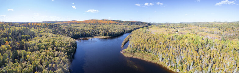 Naklejka premium Aerial view of the Montreal river and landscape in autumn