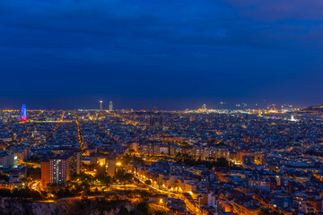 Fototapeta na wymiar Scenic bird's eye view of Barcelona city at evening twilight