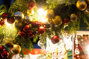 Fototapeta na wymiar Christmas holidays decorations. Festive Christmas tree and decorations on street