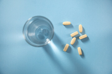 glass of water and drug