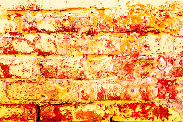 Texture of a brick wall with cracks and scratches which can be used as a background