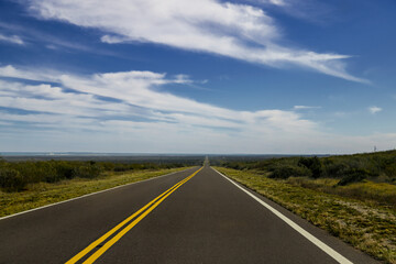 Straight road centered in the Patagonian steppe of Chubut, Argentina