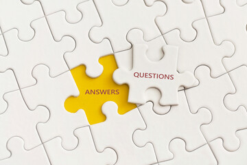 White details of puzzle with the text Answer and Question on yellow background.