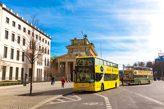BERLIN, GERMANY - MARCH 22, 2015: tourist double decker bus near Brandenburg gate in Berlin on March 22, 2015