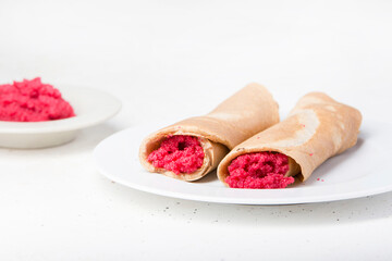 Blinis (crepes with red caviar typical of the Russian carnival)