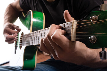 green guitar man playing close ups 