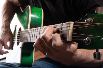 green guitar man playing close ups stock photo royalty free 