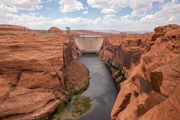 Glen Canyon Dam is a concrete arch-gravity dam on the Colorado River in northern Arizona