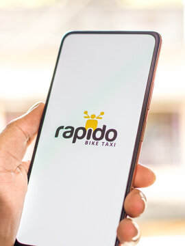 West Bangal, India - September 28, 2021 : Rapido logo on phone screen stock image.