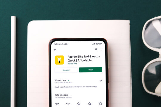 West Bangal, India - September 28, 2021 : Rapido logo on phone screen stock image.