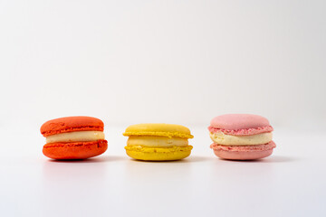 Macaroons on a white background, colorful macaroons french cookies. Macaroons. Gift for March 8th. Valentine's Day