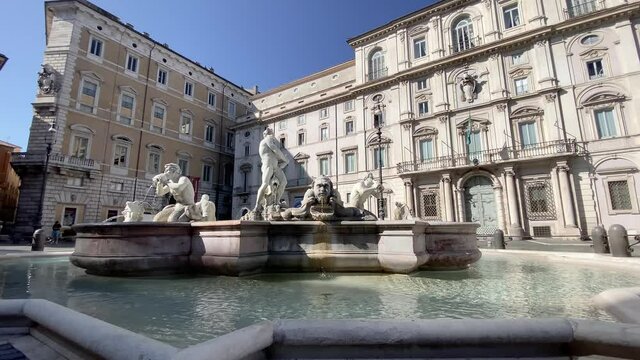 The Fontana del Moro (Moor Fountain) in Piazza Navona in Rome on a sunny morning.