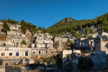 Fototapeta na wymiar Kayakoy village, abandoned Greek village in Fethiye, Turkey. Kayakoy is a ghost town due to the population exchange, the largest in Asia Minor, Anatolia