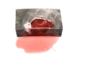 Sponge with red cleanser chemical liquid, detergent for housekeeping isolated on white background