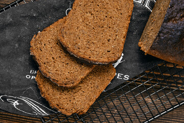 Overhead view of slices of artisan rye bread.