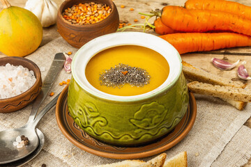 Vegetable cream soup. Traditional autumn hot food, croutons, and spices