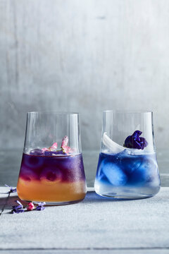 Studio shot of colorful honey and coconut cocktails