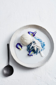 Overhead view of sago butterfly pea and ice cream