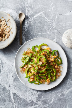 Overhead view of Mara Pad Kai (bitter melon and egg stir fry)