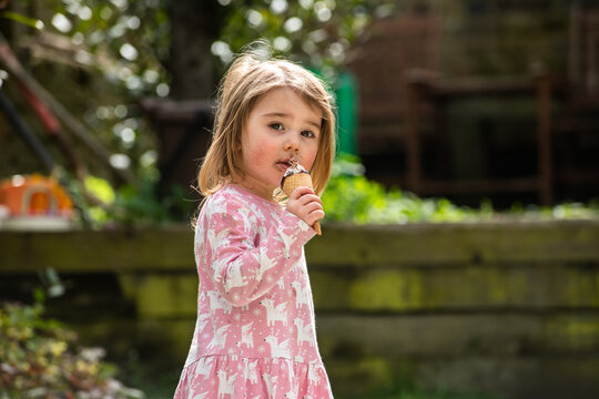 UK, Portrait of girl  with ice cream cone