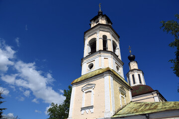 Fototapeta na wymiar Bell tower of old monastery in Russia