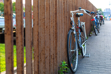Fototapeta na wymiar Bicycle parking in Europe. Popular urban transport