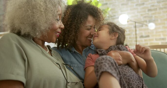 Close up of three generations of women from the same family