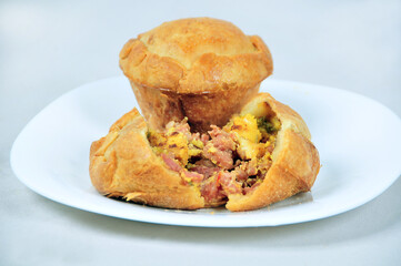 delicious chicken pie, typical of Brazilian cuisine, baked and stuffed with chicken, potato, cheese, olive and cream