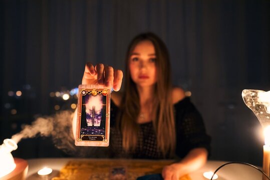 Fortune teller female hands and tarot cards