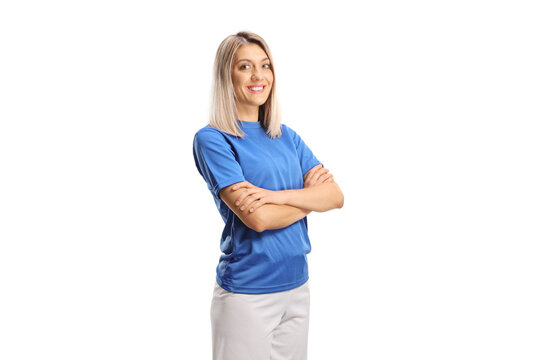 Portrait of a young female athlete in a blue sport jersey posing with crossed hands
