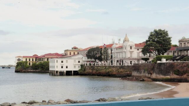 Streets of Casco Viejo in Panam&aacute; during the day in between the old buildings and roads in which people transit by