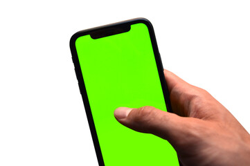 Photo of a hand holding a mobile device - iPhone template with green screen to add a customized image or text with chroma key - Smartphone blank screen to show an app, game or website on display