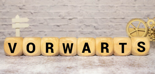 word VORWARTS on wooden block. business concept image