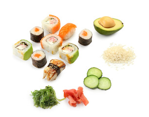 Different sushi, rolls and ingredients on white background