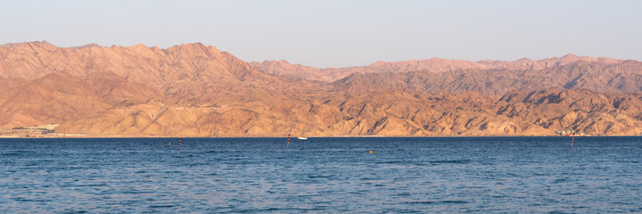 The view of Jordan from Eilat Israel across the Red Sea
