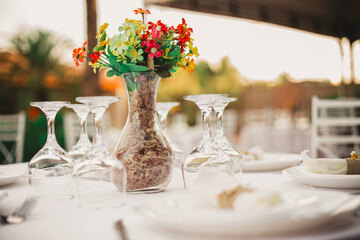 Beautiful Brazilian wedding party, outdoor, decoration and many wedding sweets at sunset, love story