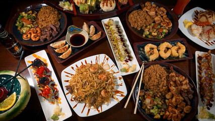 Top view of a rich table with traditional Asian food